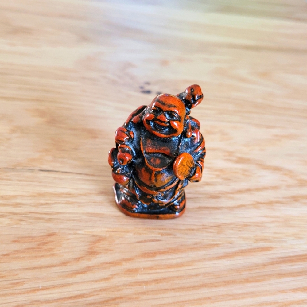 Small burgundy Buddha